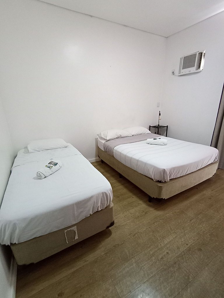 Quarto amplo com Ar/C e *Netflix* - A11