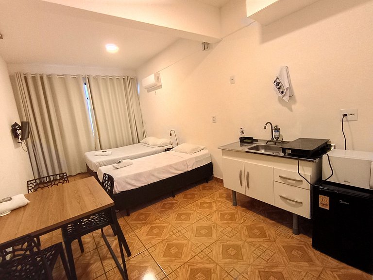 Suíte espaçosa localização 10 * Vila Olímpia - A34